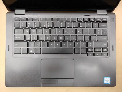 There is a piece of plastic broke off by the SC slot (View image 9). The back corner of the lid has a piece of plastic broke off as well (View image 10). The screw on the bottom just spins