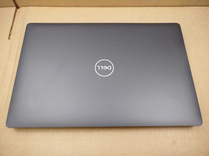 There is some faint white spots in the lower portion of the screen (View image 9). The corner of the bottom plate is broke off