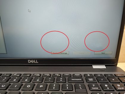 There is some faint white spots in the lower portion of the screen (View image 9). The corner of the bottom plate is broke off