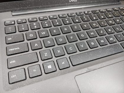 also has paint on it as well (View image 10). thwe left and right side of thew laptop is scuffed and scratched up. The bottom is missing both rubber strips. Tested and Working. Boots to the BIOs. May have a few minor cosmetic scratches/scuffs. For your help