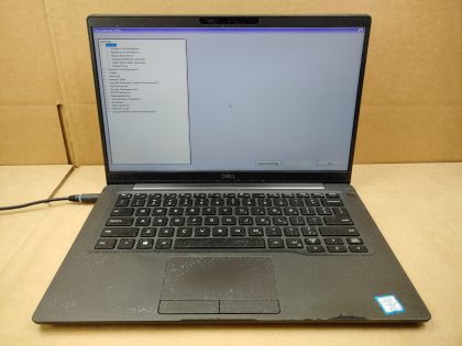 The laptop is covered in over spray from white paint (View image 4 & 5) The screen has wear and scuffs from the palmrest/keyboard