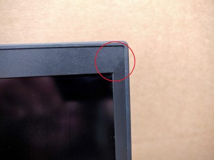 There is a tiny hairline crack in the top right corner of the screen bezel.& ;Tested and Working as it should. Boots to the BIOs. May have a few minor cosmetic scratches/scuffs. For your help