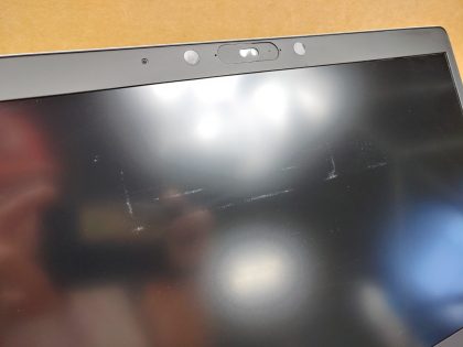 There is some wear on the screen from the palmrest/keyboard (View image 9). Tested and Working. Boots to the BIOs. May have a few minor cosmetic scratches/scuffs. For your help