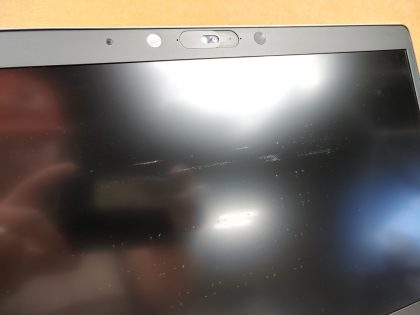 There is some light screen wear from the palmrest/keyboard (View image 9). The bottom is missing 2 rubber feet (View image 6). Tested and Working. Boots to the BIOs. May have a few minor cosmetic scratches/scuffs. For your help