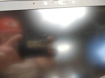 There is some light screen wear from the palmrest/keyboard (View image 9). Tested and Working. Boots to the BIOs. May have a few minor cosmetic scratches/scuffs. For your help