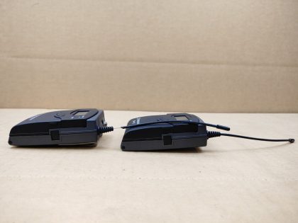 LOT of 2 - One transmitter is missing a piece of rubber around the antenna. One is missing the belt clip. Overall Good Condition