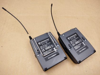 LOT of 2 - One transmitter is missing a piece of rubber around the antenna. One is missing the belt clip. Overall Good Condition