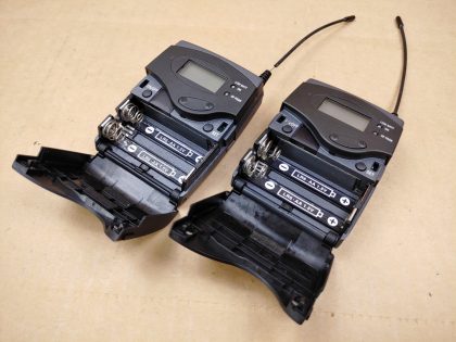 LOT of 2 - One transmitter is missing a piece of rubber around the antenna. One is missing the belt clip. Overall Good Condition