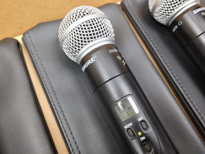 There is some writing engraved on the upper portion& ;on the Microphones. 2 have small dents in the top piece. There is some light cosmetic scratches from normal use. Good Condition