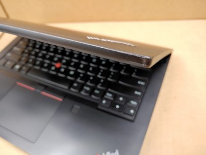 **BIOS PASSWORD (View image 9)** Bottom plate is missing a handful of screws (View image 6). Both top corners of the lid is slightly blemished (View images 10 & 11). Touchpad and keys have a little wear. Tested and Working. Boots to the BIOs. May have a few minor cosmetic scratches/scuffs. For your help