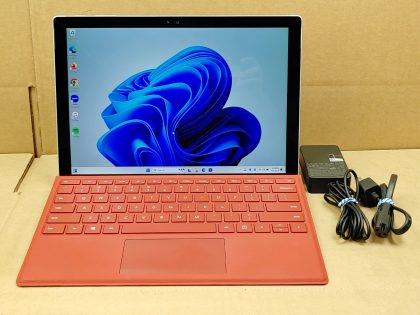 There is a small spot of very light wear from the touchpad. There is a super faint pressure mark in the bottom middle of& ; the screen. Fully Tested & 100% Functional ready to use out of the box