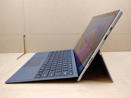 There is a very faint small wear spot on the screen from the touchpad. Fully Tested & 100% Functional ready to use out of the box