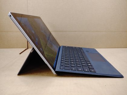 we have added actual images to this listing of the Microsoft Surface you would receive. Clean install of Windows 10 Pro Operating system. May have some minor scratches/dents/scuffs.[ What is included: Microsoft Surface + Power Adapter + 30-Day Warranty Included ]Item Specifics: MPN : 1724UPC : N/AType : LaptopBrand : MicrosoftProduct Line : SurfaceModel : Surface Pro 4Operating System : Windows 10 Pro x64Screen Size : 12.3" TouchscreenProcessor Type : Intel Core i5-6300U 6th GenProcessor Speed : 2.40GHz / 2.50GHzGraphics Processing Type : Intel(R) HD Graphics 520Memory : 4GBHard Drive Capacity : 128GB SSD - 1