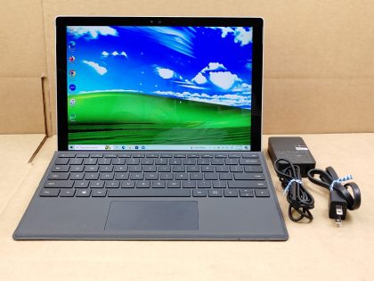 The screen has a few very light wear spots from the keyboard/palmrest. Fully Tested & 100% Functional ready to use out of the box