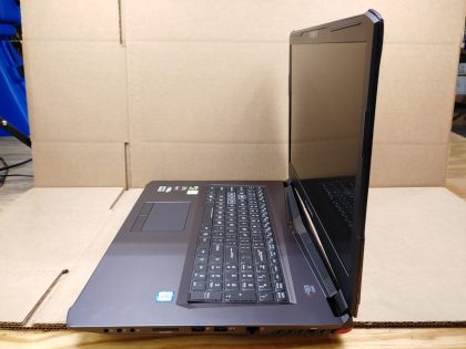 **NO POWER (DOA)** LAPTOP DOES NOT POWER. Corner of the keyboard bezel is bent up (View image 9). Screen looks to be in good condition with no signs of cracks or damages. May have a few minor cosmetic scratches/scuffs. For your help