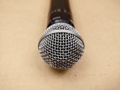 There is some small writing engraved around upper part of the microphone. The cap has a few small dents. The battery cover that screws on has a few hairline cracks around the top. Overall Good Condition