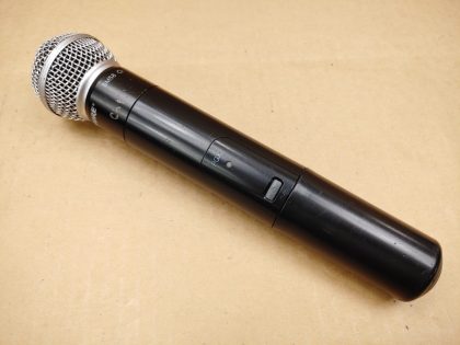 There is some small writing engraved around upper part of the microphone. The cap has a few small dents. The battery cover that screws on has a few hairline cracks around the top. Overall Good Condition