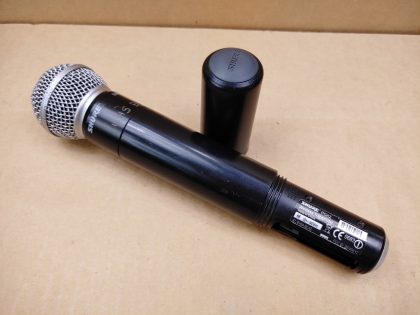 There is some small writing engraved around upper part of the microphone. The cap has a few small dents. The battery cover that screws on has a few hairline cracks around the top. Overall Good Condition