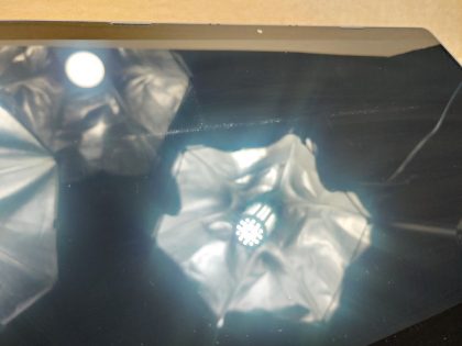 The bottom left corner of the screen/bezel is separating when its flipped into tablet mode (View image 8). The screen has wear from the keyboard/palmrest (View image 9). There is a small crack in the plastic by the SC slot (View image 10). Tested and Working. Boots to the BIOs. May have a few minor cosmetic scratches/scuffs. For your help