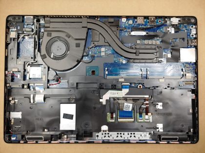 There is a very tiny faint spot of wear from the keyboard/palmrest. Tested and Working. Boots to the BIOs. May have a few minor cosmetic scratches/scuffs. For your help