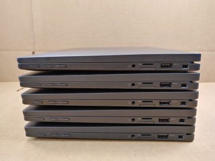 Boots to the BIOs. One laptop has a few very faint specks of wear from the keyboard